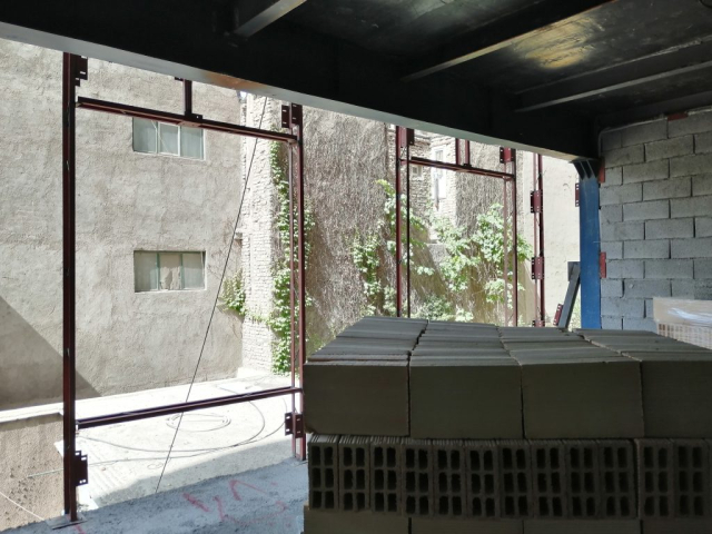 گروه مهندسین اسپرلوس مجری مهار بندی دیوارهای غیر بابر و نما، با استفاده از والپست و مش الیاف شیشه